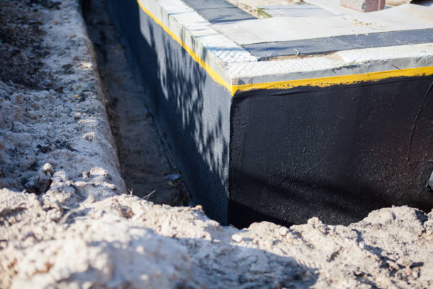 Professional Waterproofing technician working in Abrams, WI